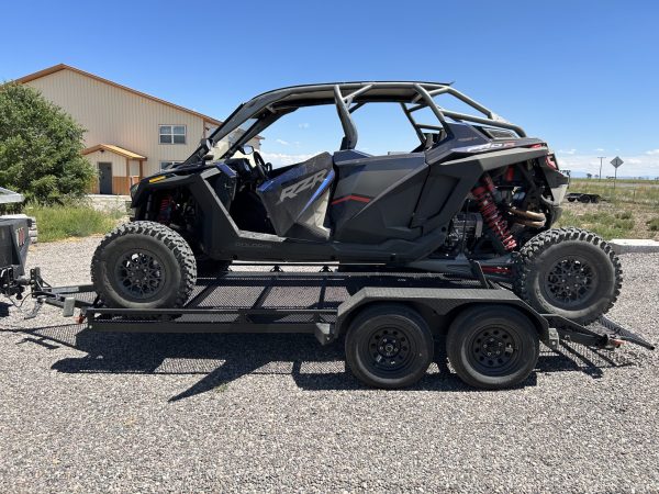 Side w/ 4 Cylinder engine on a 14 Ft Tandem Trailer w/ No Lift Ramp