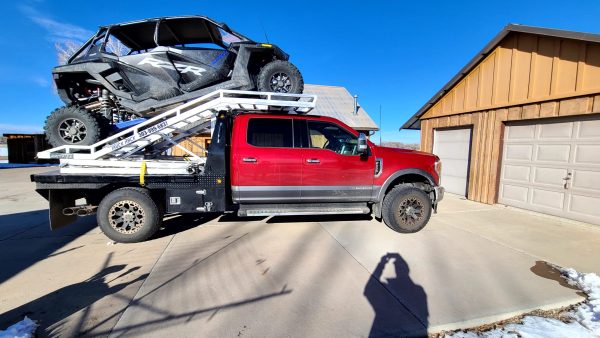Truck Rack on Flatbed supporting long side by side wheelbase